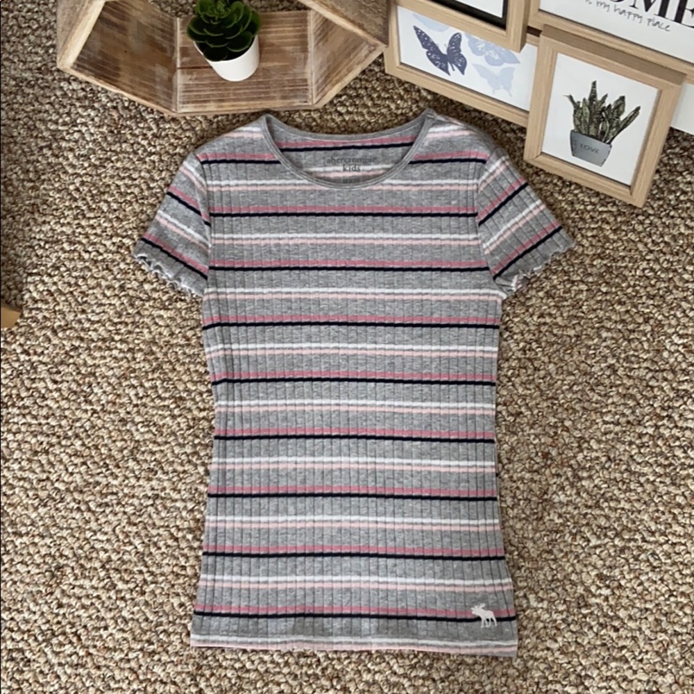 A grey shirt with stripes